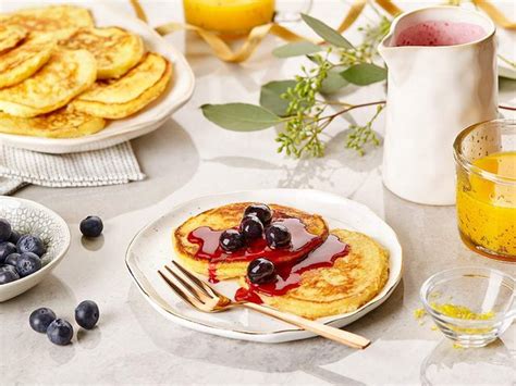 lemon-ricotta-pancakes-with-blueberry-sauce image