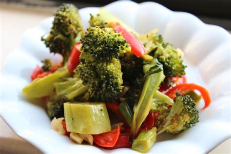 garlic-roasted-broccoli-and-red-peppers-the-spruce image