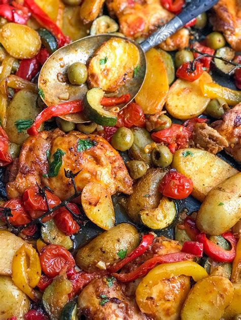 baked-chicken-thighs-with-potatoes-peppers-and-olives image