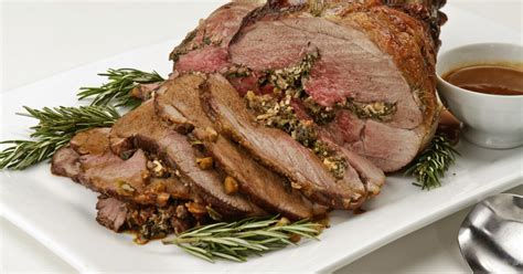 leg-of-lamb-stuffed-with-greens-feta-and-pine-nuts image