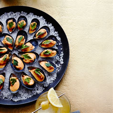 chilled-mussels-with-saffron-mayo-recipe-myrecipes image