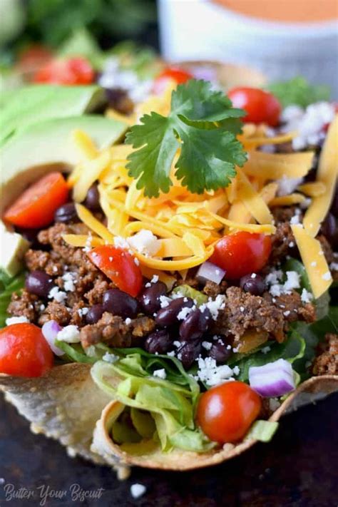 taco-salad-with-homemade-tortilla-bowls-butter image