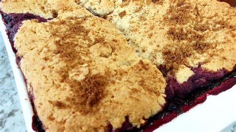 butterscotch-mango-berry-cobbler-with-whipping-cream image