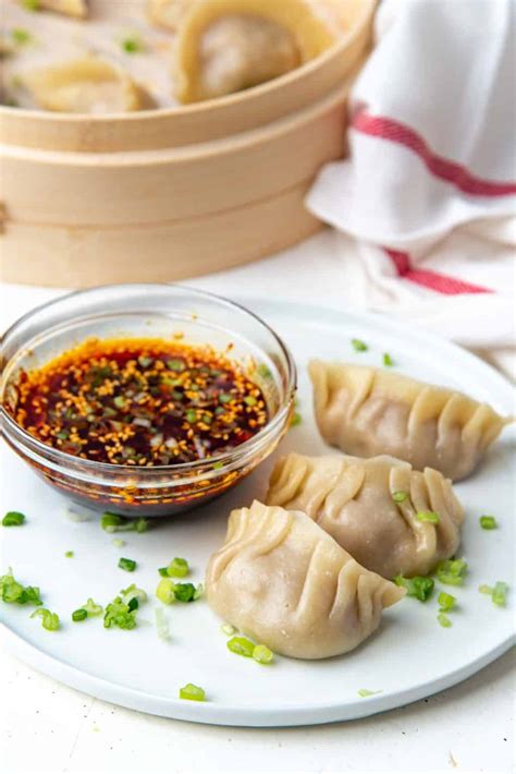 juicy-steamed-chicken-dumplings-the-flavor-bender image