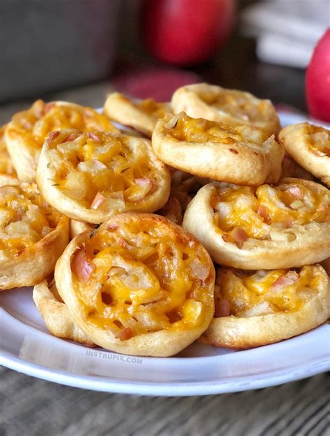 easy-apple-cheddar-pinwheels-recipe-baked-appetizer image