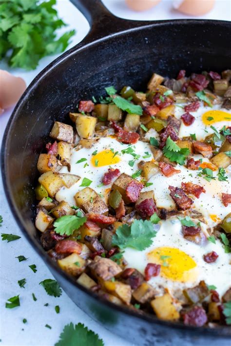 breakfast-potato-hash-with-eggs-bacon-evolving-table image