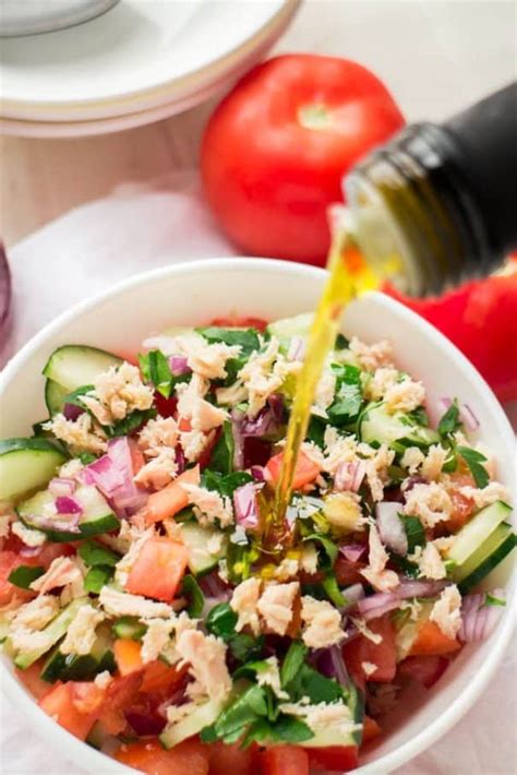 tuna-cucumber-tomato-salad-with-olive-oil-dressing image