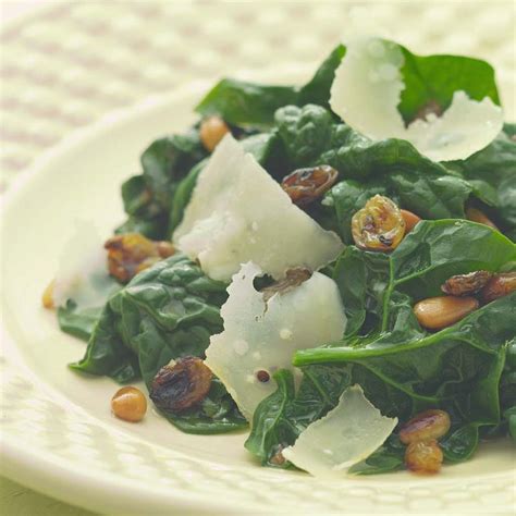 sauteed-spinach-with-pine-nuts-golden-raisins image