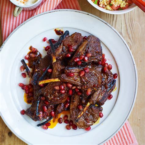 lamb-cutlets-with-harissa-and-pomegranate-molasses image
