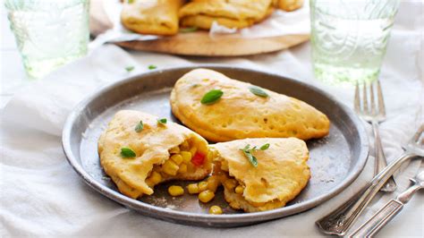 sweet-corn-red-pepper-and-green-chile-empanadas image