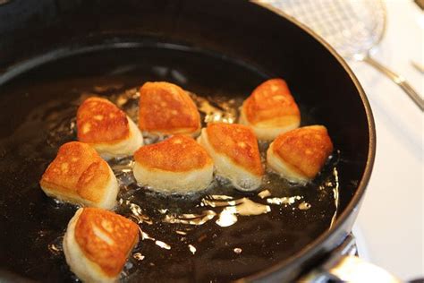 biscuit-beignets-with-praline-sauce-kevin-amanda image