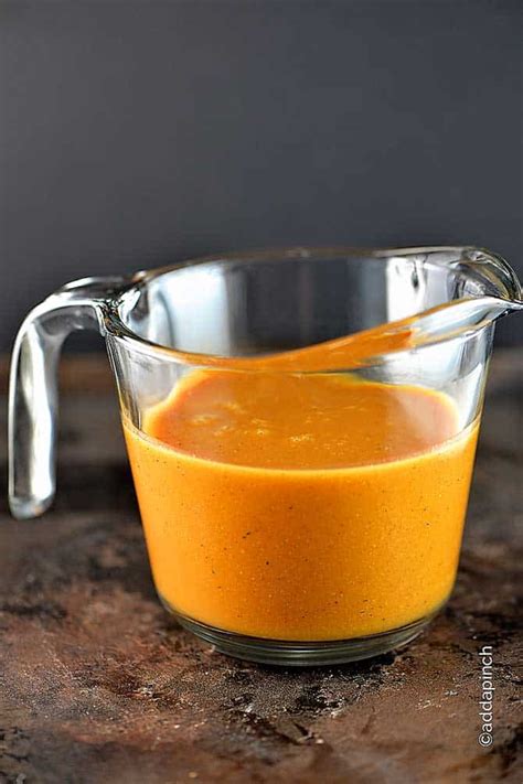 spicy-mustard-bbq-sauce-recipe-add-a-pinch image