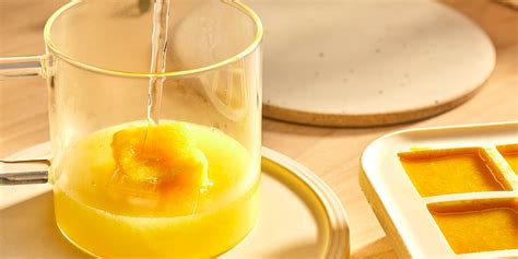 frozen-lemon-ginger-turmeric-shots-eatingwell image