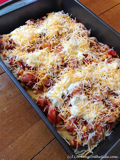 layered-chicken-enchiladas-cooking-on-the-side image