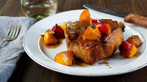 pork-chops-with-glazed-peaches-food-network image