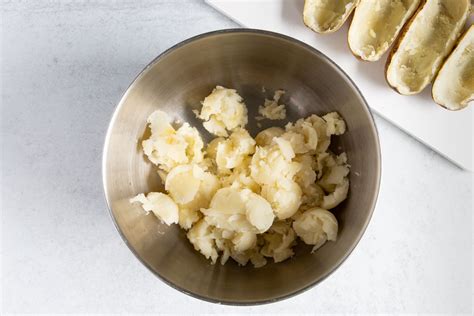 stuffed-baked-potato-recipe-the-spruce-eats image