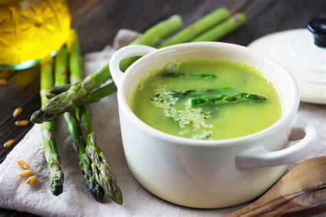 green-and-creamy-vegan-cream-of-asparagus-soup image