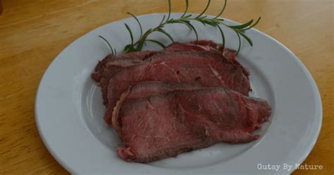 easy-garlic-and-rosemary-roast-beef-gutsy-by-nature image