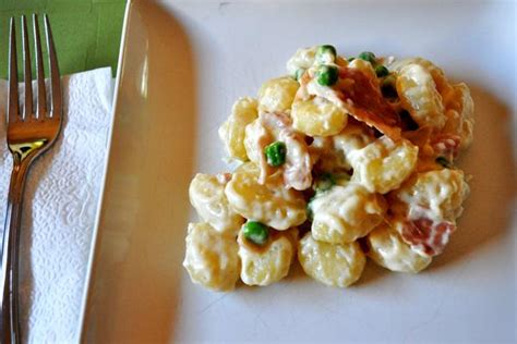 gnocchi-is-a-dream-in-parmesan-cream-sauce-with-peas image