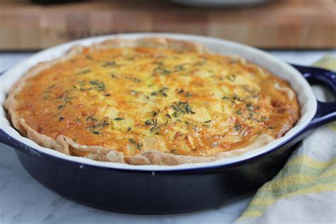apple-and-cheddar-quiche-with-olive-oil-and-thyme image