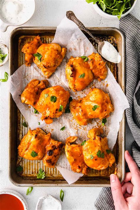 buffalo-baked-boneless-chicken-thighs-fit-foodie-finds image