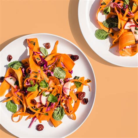 cumin-spiced-carrot-cabbage-and-radish-slaw image