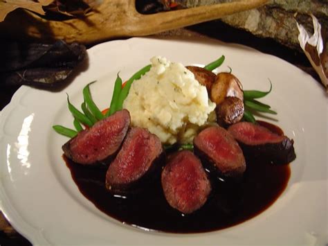 pan-seared-venison-medallions-with-balsamic-berry image