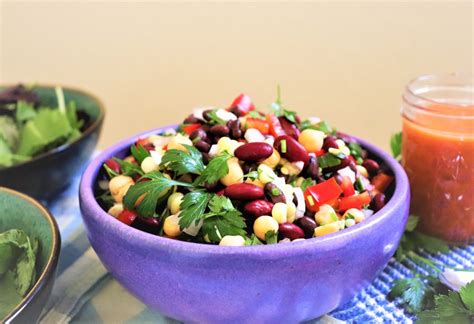 hearty-bean-dinner-salad-with-sun-dried-tomato-dressing image