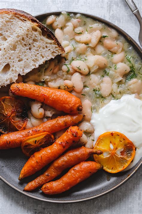 harissa-roasted-carrots-with-white-beans-and-dill image