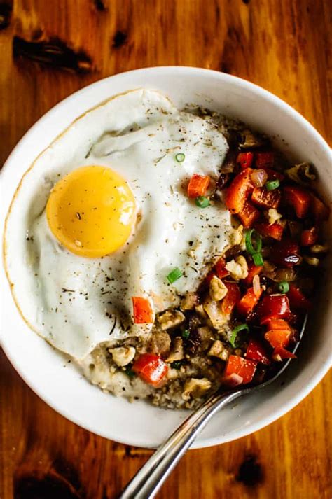 savory-oatmeal-with-cheddar-and-fried-egg-healthy image