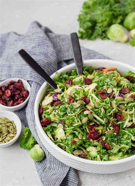 sweet-kale-salad-with-dried-cranberries-and-poppy-seed image