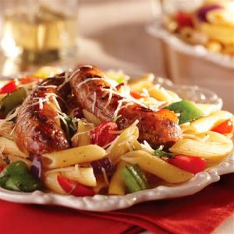 grilled-italian-sausage-and-peppers-over-penne-pasta image