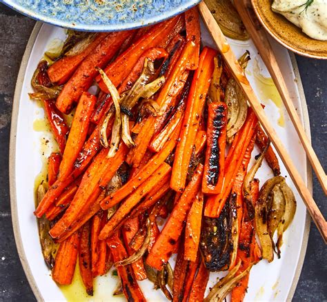 roasted-caraway-carrots-better-homes-gardens image