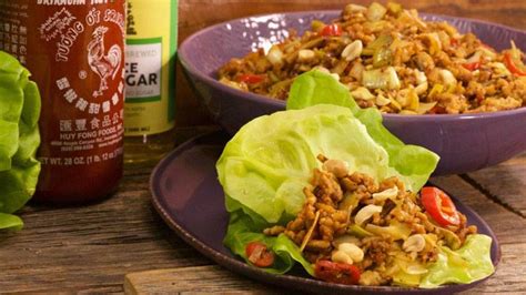 sriracha-chicken-with-peanuts-in-lettuce-wraps-rachael image