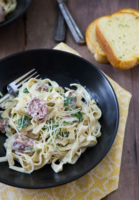 fettuccine-with-sausage-and-kale-a-zesty-bite image