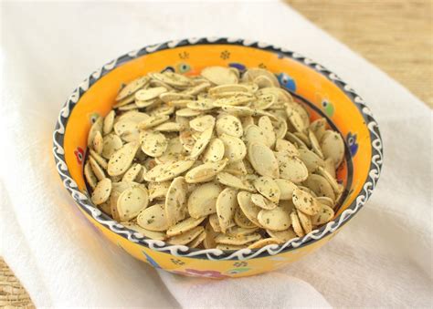 savory-rosemary-and-garlic-roasted-pumpkin-seeds image