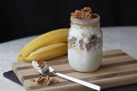 yogurt-parfait-with-banana-peanut-butter-and-corn-flakes image