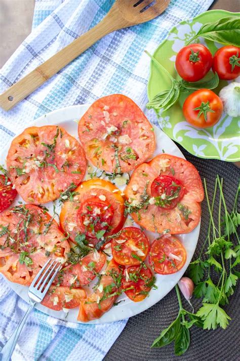 sliced-tomato-salad-with-basil-garlic-and-olive-oil image
