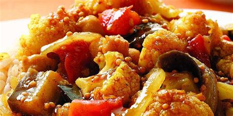 indian-spiced-eggplant-cauliflower-stew-eatingwell image