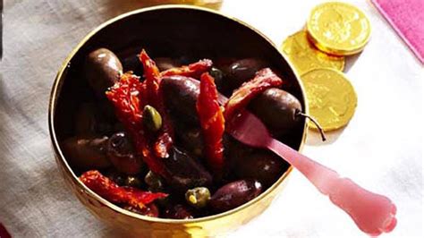 kalamata-olives-with-chopped-garlic-the-globe-and-mail image