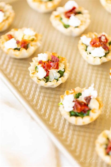 spinach-dip-bites-easy-spinach-artichoke-phyllo-cup image