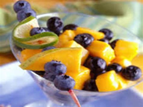 mango-blueberry-and-ginger-fruit-salad-eat-this-much image