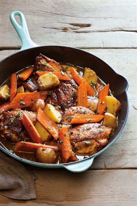 braised-chicken-thighs-with-carrots-potatoes-and-thyme image