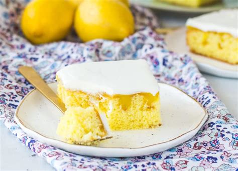 easy-lemon-poke-cake-the-itsy-bitsy-kitchen image