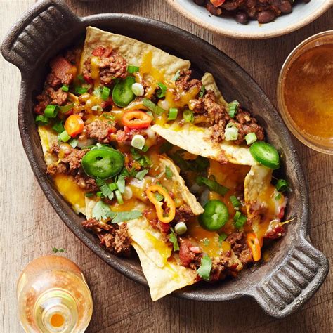 chili-cheese-nachos-recipe-eatingwell image