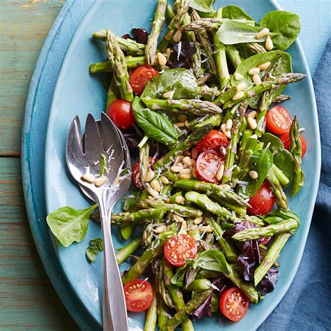 fresh-asparagus-tomato-salad-eatingwell image