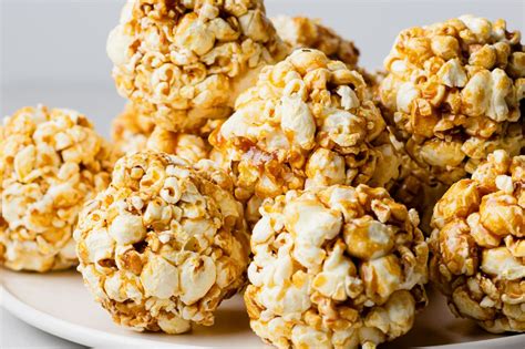 quick-and-easy-popcorn-balls-recipe-the-spruce-eats image