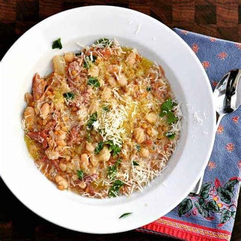 farro-white-bean-and-vegetable-soup-pinch-and-swirl image