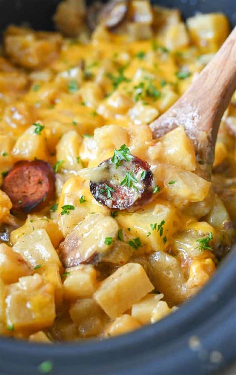 slow-cooker-sausage-and-cheesy-potatoes-butter image