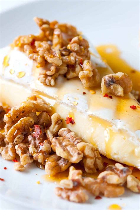 brie-with-warm-honey-and-toasted-walnuts-easy image